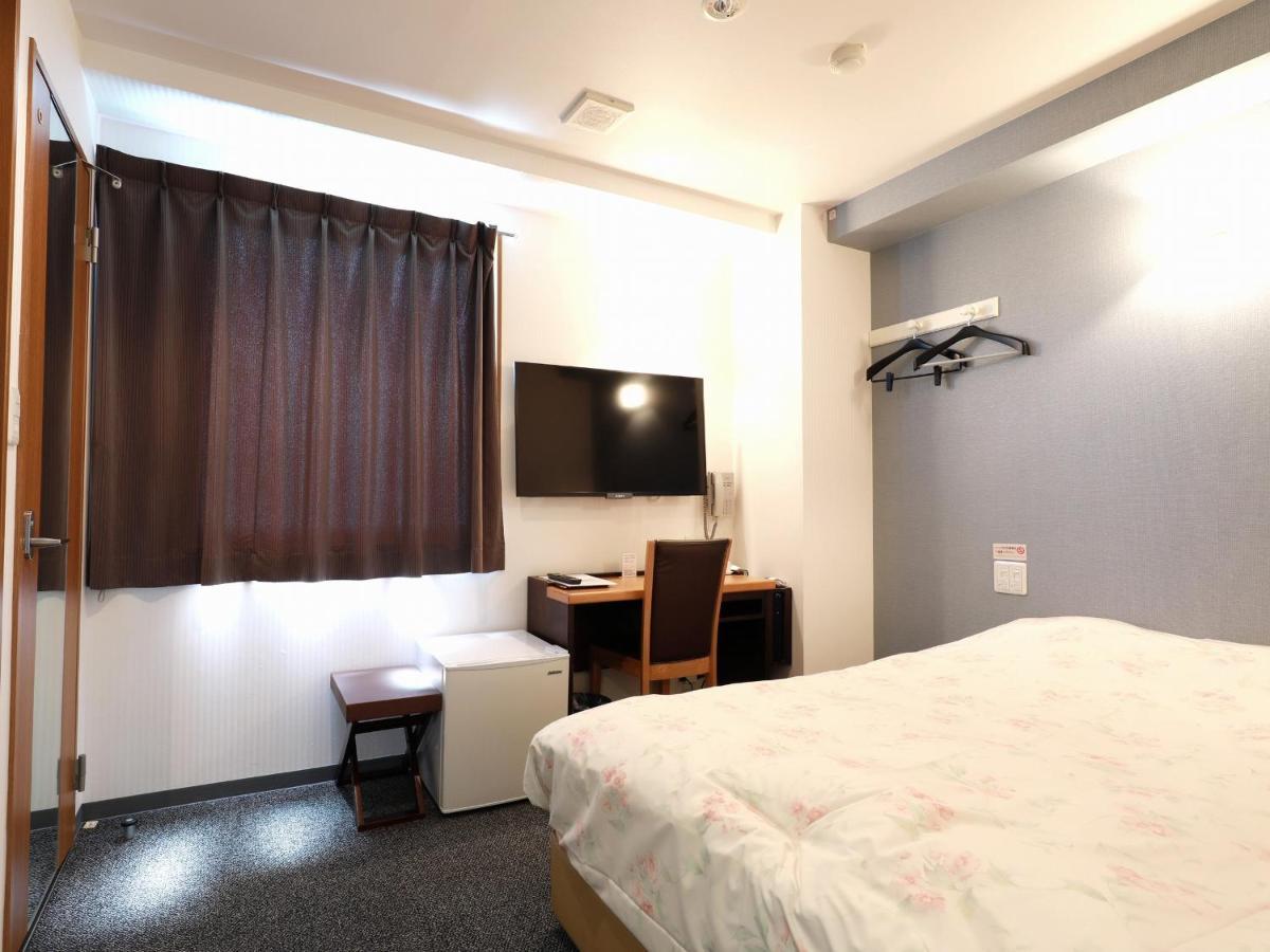 Toyama Town Hotel Bagian luar foto