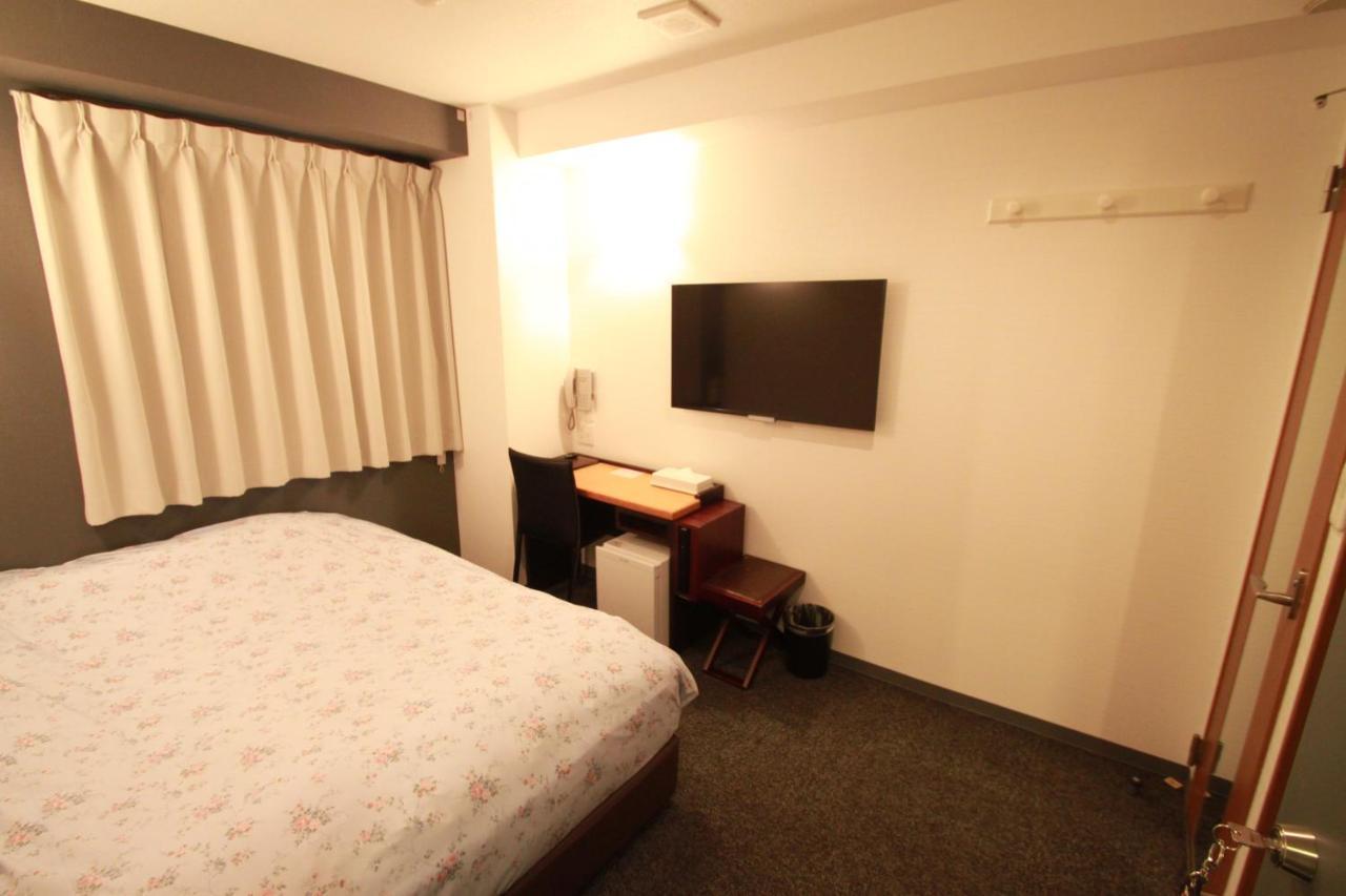 Toyama Town Hotel Bagian luar foto