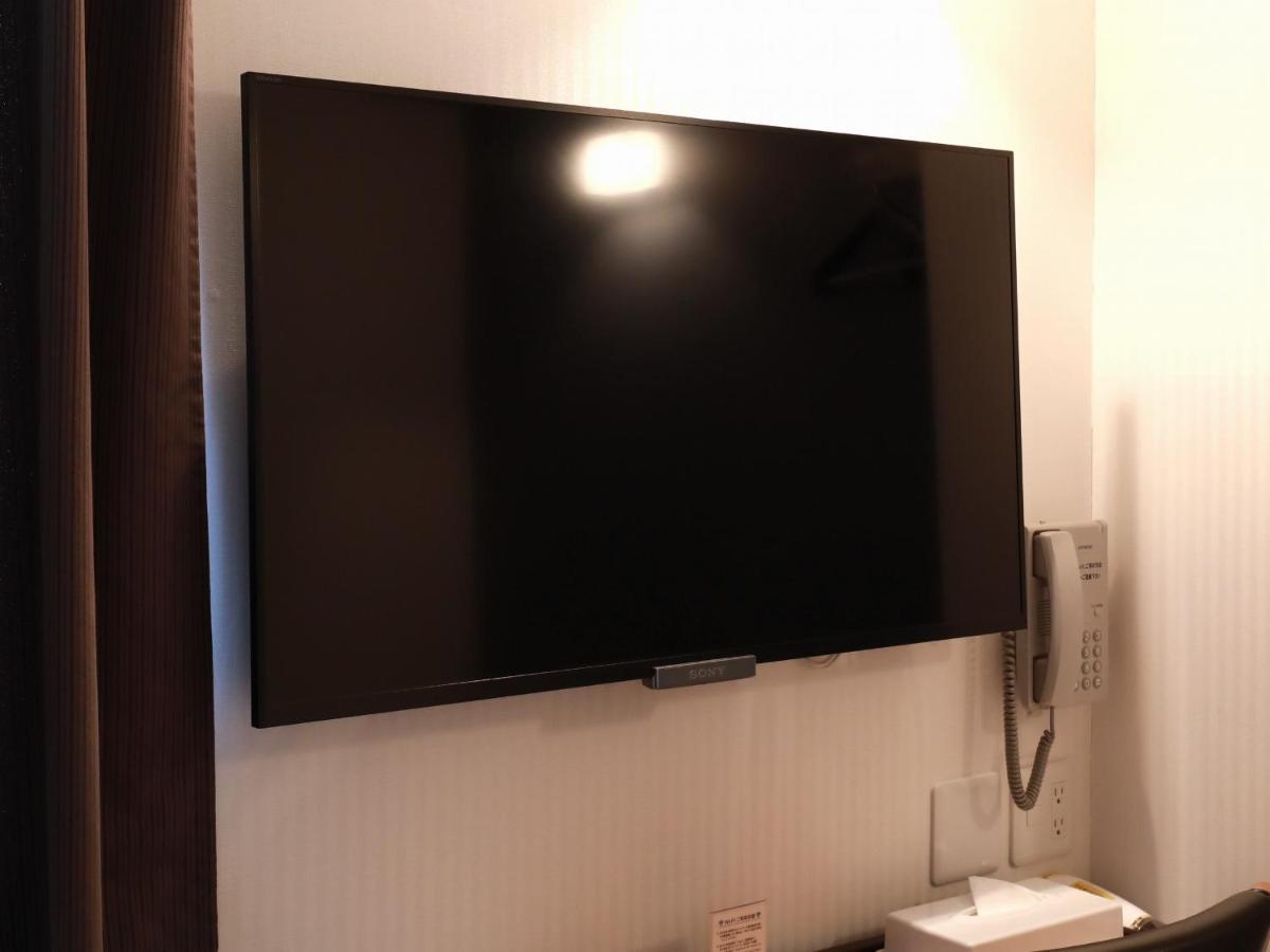 Toyama Town Hotel Bagian luar foto