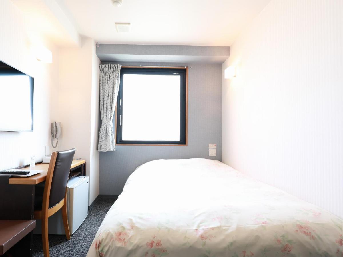 Toyama Town Hotel Bagian luar foto