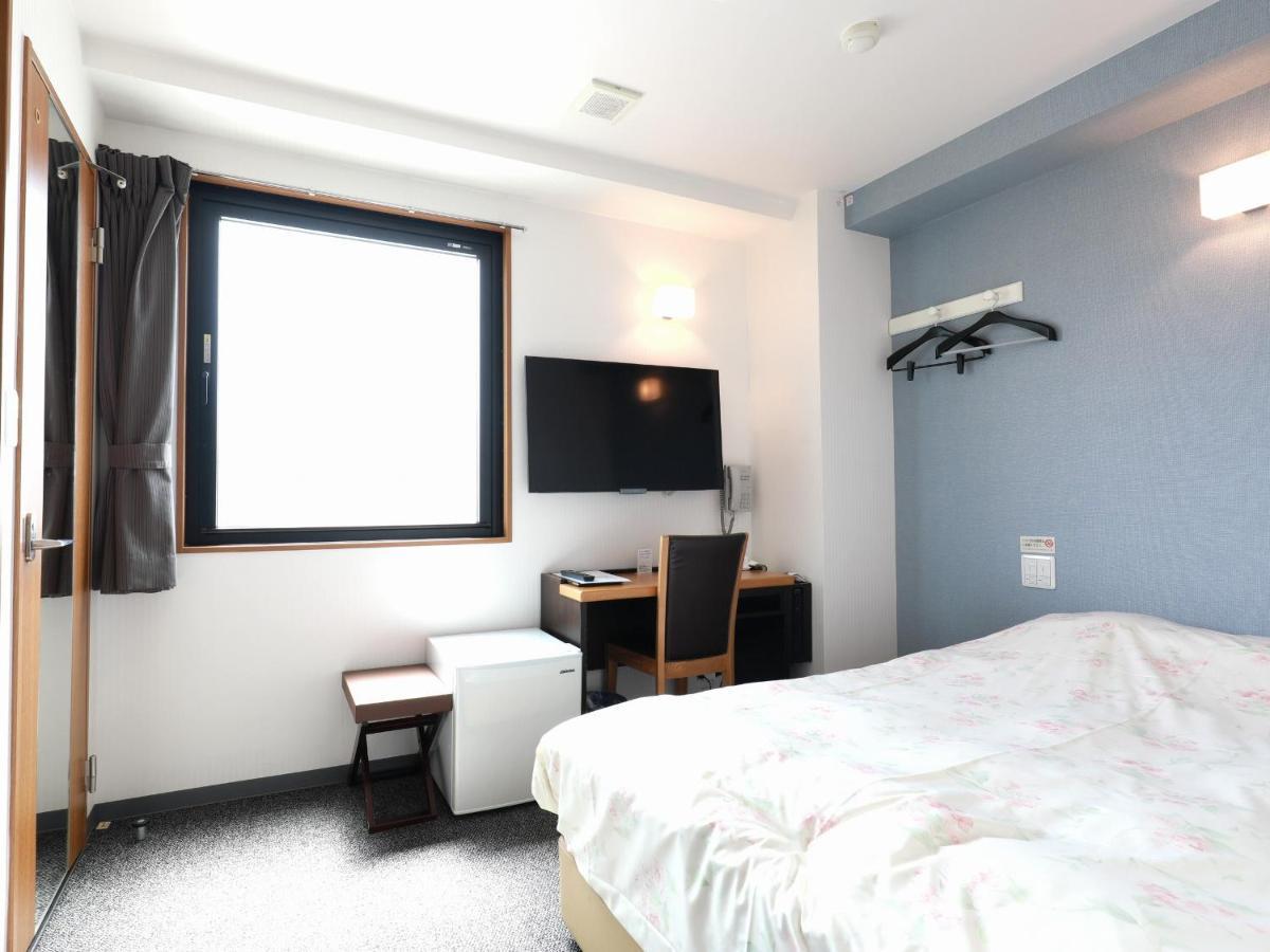 Toyama Town Hotel Bagian luar foto