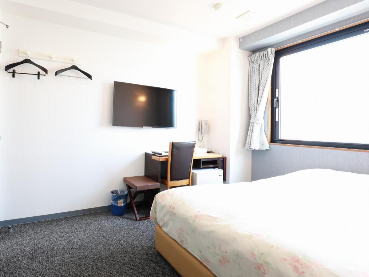 Toyama Town Hotel Bagian luar foto