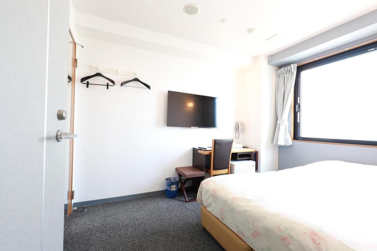 Toyama Town Hotel Bagian luar foto